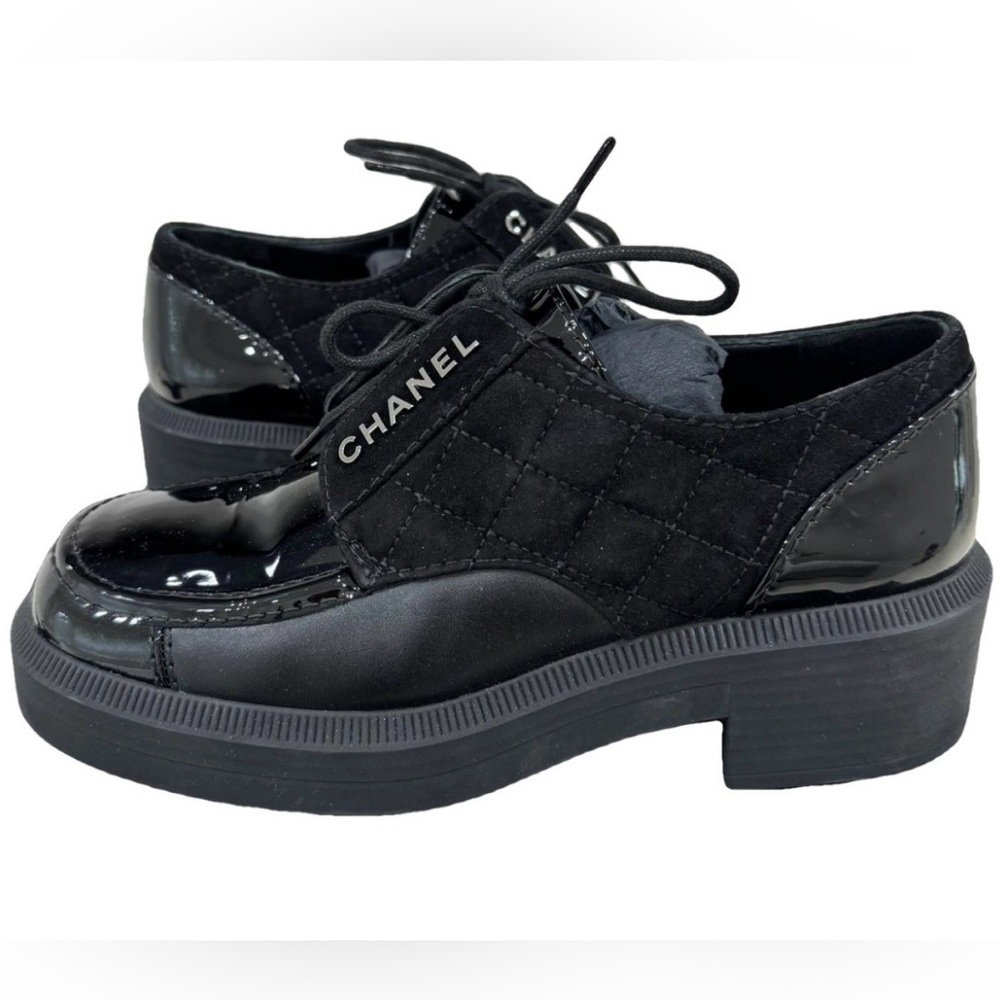 CHANEL Women's Black Quilted Lace-Up Loafers
